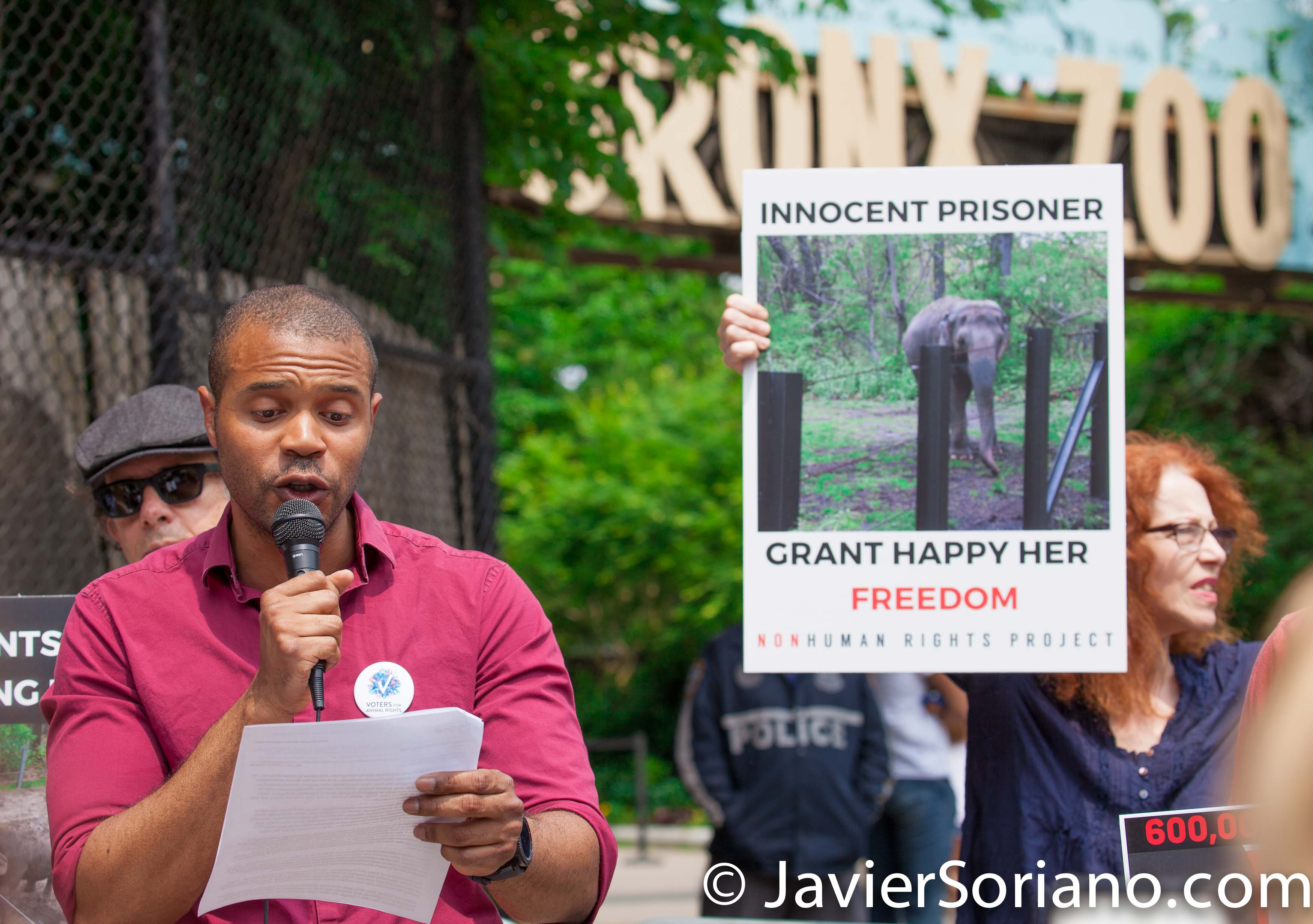 Bronx, New York City. Saturday, June 1, 2019 – Rally in support of Happy’s freedom. Happy is a wild-born elephant held alone in captivity at the Bronx Zoo. The rally was organized by the Nonhuman Rights Project and it was joined by Change.org, CompassionWorks International, Voters For Animal Rights, In Defense of Animals, and Animal Cruelty Exposure Fund. During the rally, NhRP attorney gave updates on their litigation on behalf of Happy and other efforts to obtain rights for autonomous nonhuman animals. Activists called for recognition of Happy’s fundamental rights and her transfer to sanctuary. Credit: Photo by Javier Soriano/www.JavierSoriano.com
