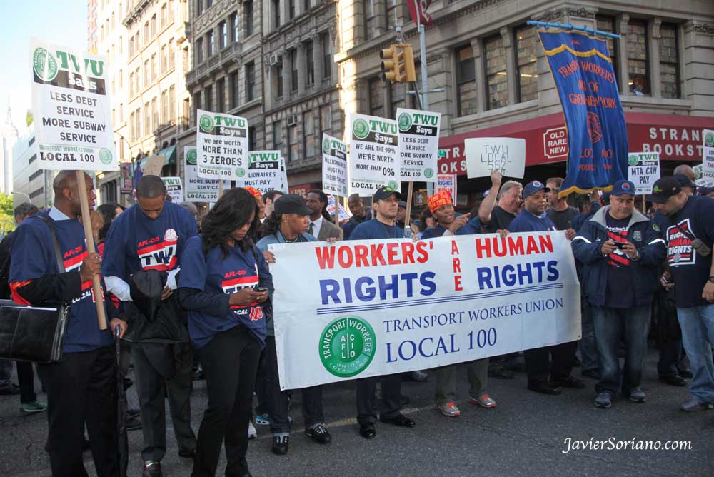 Tuesday, May 1, 2012. New York City - May Day — International Workers’ Day. "TWU. Local 100." "Workers rights are human rights."   Martes 1 de mayo de 2012. Ciudad de Nueva York - May Day - Día Internacional de los Trabajadores.    Photo by Javier Soriano/www.JavierSoriano.com