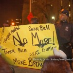 12/19/2014 City Hall, NYC - Protestors against police brutality trying to cross the Brooklyn Bridge. The sign says, "Eric Garner, Akai Gurley, Tamir Rice, Sean Bell, Trayvon Martin, Mike Brown. NO MORE!"
Photo by Javier Soriano/www.JavierSoriano.com