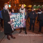 12/19/2014 City Hall, NYC - Protestors against police brutality. Their sign says, "Who do u protect. Who do u serve."
Photo by Javier Soriano/www.JavierSoriano.com
