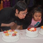 1/23/2015 NYC - Fay Chiang and a child blowing the candles of her birthday cakes.
Photo by Javier Soriano/www.JavierSoriano.com