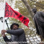10/24/2015 NYC - Rally in support of people killed by police in the United States of America.
(in the back, the monument depicts Benito Juárez (1806–1872), one of Mexico’s most loved political figures and the first Mexican figure to be commemorated with a city monument. Mexican sculptor Moises Cabrera Orozco (b. 1936) created the piece, which portrays Juárez leaning on a tablet with his quotation, “Respect for the rights of others is peace,” inscribed in both Spanish and English.)

Photo by Javier Soriano/http://www.JavierSoriano.com/