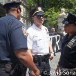 8/2/2016 - NYPD agents and #ShutDownCityHallNYC demonstrators in Abolition Park ( City Hall Park). NYC.
Photo by Javier Soriano/http://www.JavierSoriano.com/