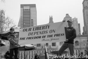 Manhattan, New York City - On Saturday, March 25th, 2017, a group of people gathered at Bryant Park and marched to the New York Times building to support freedom of the press. An activist with a sign that says, "Our liberty depends on the freedom of the press" Photo by Javier Soriano/www.JavierSoriano.com
