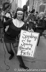 3/25/2017 NYC - People for Free Press. Activists in front of the New York Times building. "Spankings for spewing alternative facts!" Photo by Javier Soriano/www.JavierSoriano.com