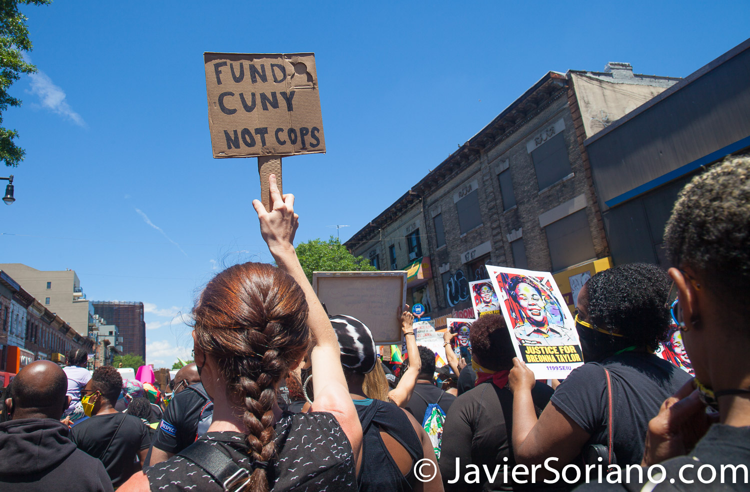 Sunday, June 14, 2020. Brooklyn, New York City - Caribbean Americans gathered on Flatbush Ave and Church Ave in Flatbush and marched to Grand Army Plaza for a rally. Protestors demanded justice for George Floyd, Breonna Taylor and the many other people killed by police officers in the United States of America. They also demanded that Council members and NYC Mayor Bill de Blasio cut the NYPD budget by at least one billion. Allies of the Caribbean community joined the march and rally. Photo by Javier Soriano/www.JavierSoriano.com
