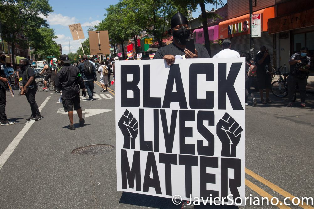 Sunday, June 14, 2020. Brooklyn, New York City - Caribbean Americans gathered on Flatbush Ave and Church Ave in Flatbush and marched to Grand Army Plaza for a rally. Protestors demanded justice for George Floyd, Breonna Taylor and the many other people killed by police officers in the United States of America. They also demanded that Council members and NYC Mayor Bill de Blasio cut the NYPD budget by at least one billion. Photo by Javier Soriano/www.JavierSoriano.com