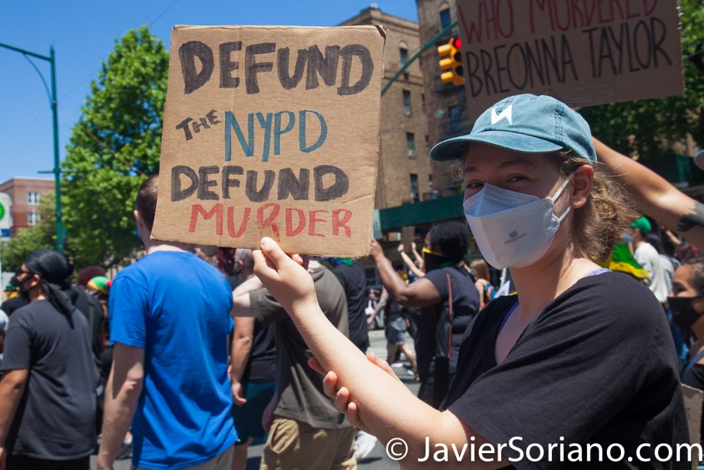 Sunday, June 14, 2020. Brooklyn, New York City - Caribbean Americans gathered on Flatbush Ave and Church Ave in Flatbush and marched to Grand Army Plaza for a rally. Protestors demanded justice for George Floyd, Breonna Taylor and the many other people killed by police officers in the United States of America. They also demanded that Council members and NYC Mayor Bill de Blasio cut the NYPD budget by at least one billion. Allies of the Caribbean community joined the march and rally. Photo by Javier Soriano/www.JavierSoriano.com