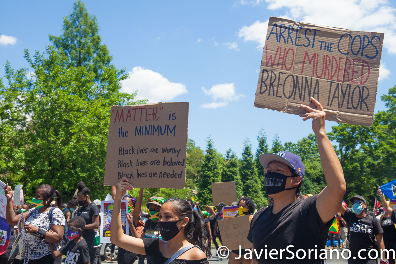 Sunday, June 14, 2020. Brooklyn, New York City - Caribbean Americans gathered on Flatbush Ave and Church Ave in Flatbush and marched to Grand Army Plaza for a rally. Protestors demanded justice for George Floyd, Breonna Taylor and the many other people killed by police officers in the United States of America. They also demanded that Council members and NYC Mayor Bill de Blasio cut the NYPD budget by at least one billion. Allies of the Caribbean community joined the march and rally. Photo by Javier Soriano/www.JavierSoriano.com