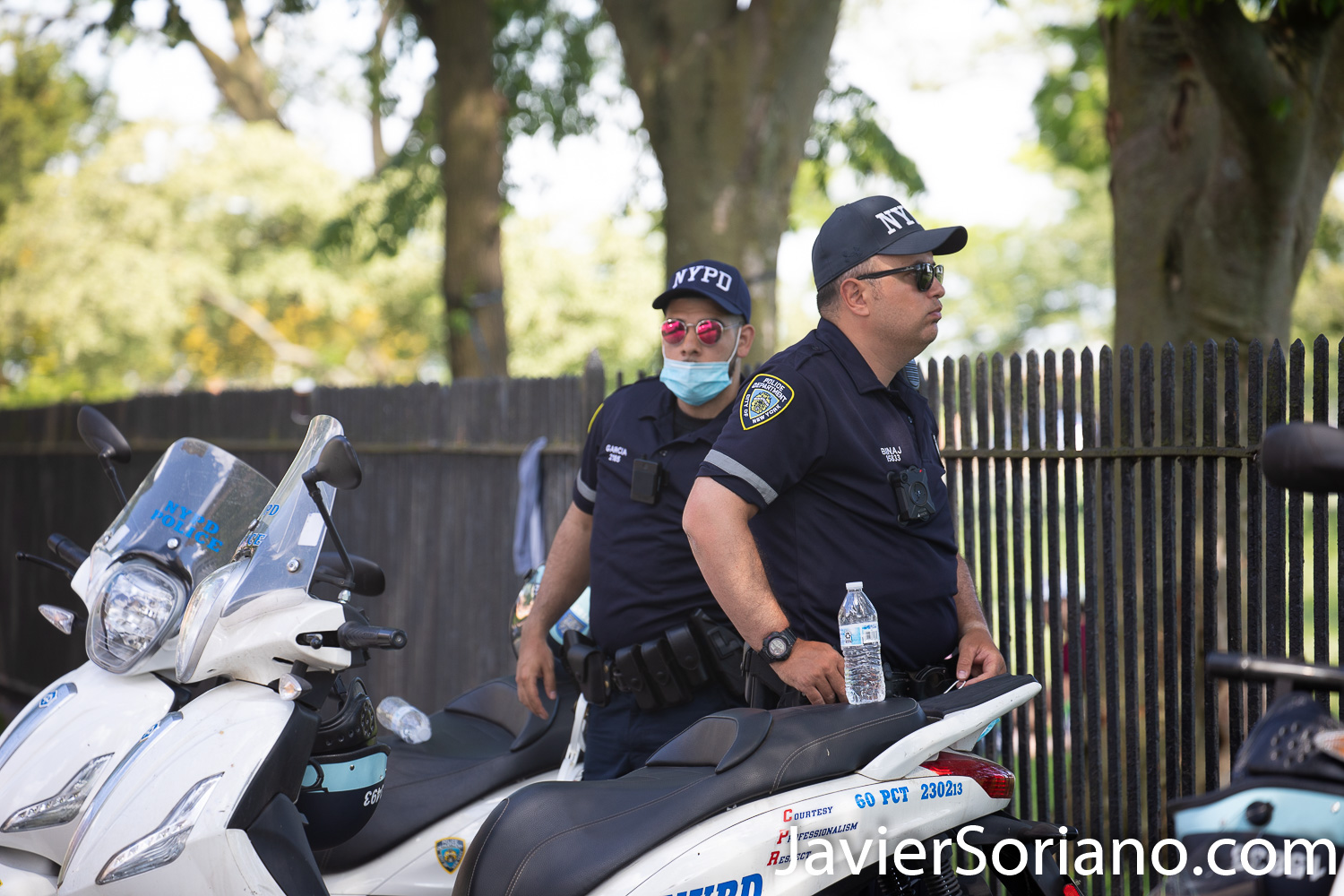Friday, June 12, 2020. Brooklyn, New York City - Rally and march in Coney Island. Protestors said it was a "Peaceful demonstration for George Floyd, Breonna Taylor and the many other victims of police brutality." One NYPD officer is not wearing a mask. Another officers is wearing the mask incorrectly. Protestors want NYPD officers to wear a mask. Photo by Javier Soriano/www.JavierSoriano.com