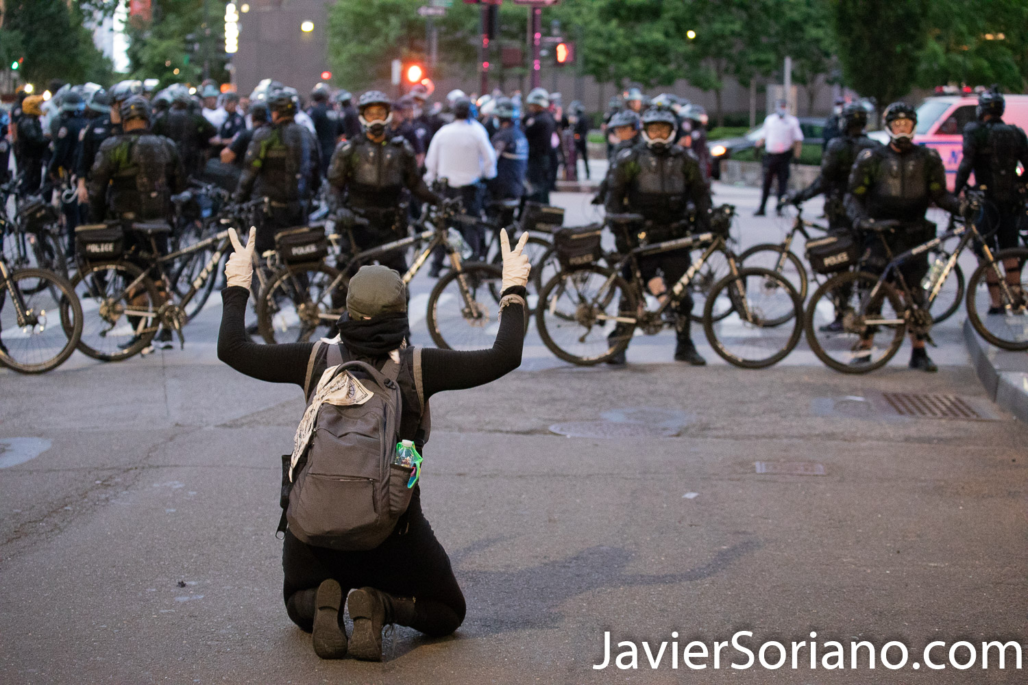 Tuesday, June 2, 2020. New York City - March from The Stonewall Inn to the Lower Manhattan to demand justice for George Floyd, Breonna Taylor, and too many others victims of police violence in the United States of America. NYPD officers arrested a some people. Officers arrested them because the new curfew started at 8 P.M. Must protestors ran. A female protestor stayed in the same area were police officers were arresting people. She wanted officers to join protestors and don't arrest them. An officer ordered her to move. She did not move. She was not arrested. Protestors were peaceful all the time. The curfew in New York City exempts members of the press. Photo by Javier Soriano/www.JavierSoriano.com