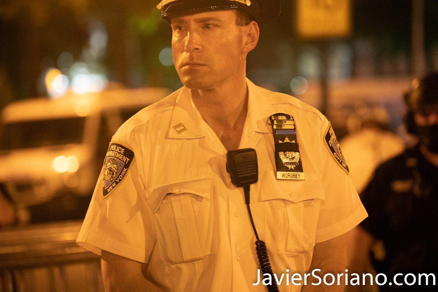 Thursday, July 30, 2020. Manhattan, New York City - Rally and March: “Not in our city. Not on our watch.”  Demonstrators gathered at Foley Square Park where they had a rally. Speakers spoke in support of undocumented immigrants, Trans women, Trans men and the Black community, in general.  After the rally, protesters marched to Park Row and Worth St where activists staged a Die-in for victims of police brutality in New York and in the country.  Demonstrators also demanded the resignation of the New York City Police Commissioner, Dermot Shea.   This is NYPD Worobey watching protesters.  Photo by Javier Soriano/www.JavierSoriano.com