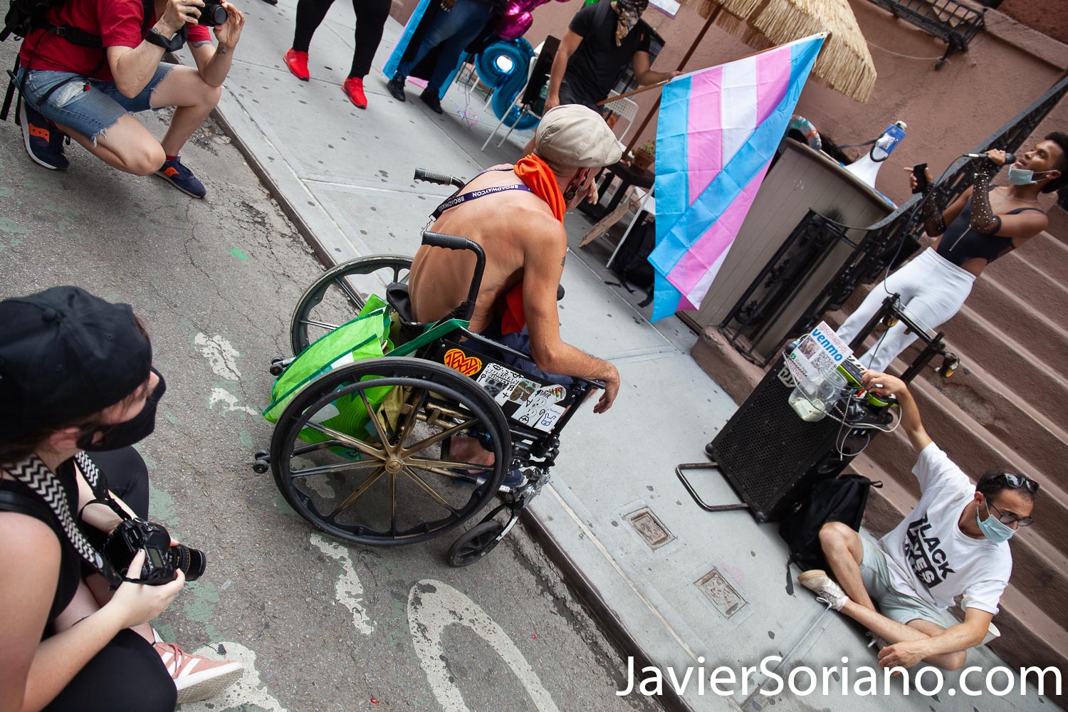Thursday, July 30, 2020. Manhattan, New York City - Rally and March: “Liberation for Black Queer and Trans people.” Protesters had a rally in front of The Stonewall Inn. After the rally, they marched to Foley Square Park. A Trans woman said sometimes Trans women and Trans men are killed by police and sometimes they are killed by their own community. Activists said all Black Lives Matter. Joel rivera said, the rally and march was to honor and acknowledge Black Queer and Trans people. The male protester on the wheelchair harassed a female photographer, a male photographer and me. Three women asked him to stop. Photo by Javier Soriano/www.JavierSoriano.com