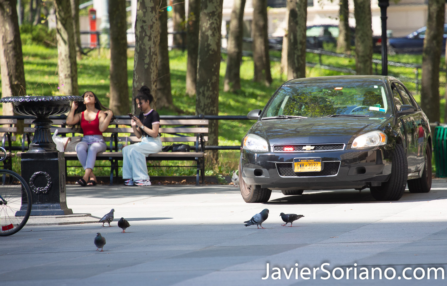 Saturday, July 18, 2020. Brooklyn, New York City – “The Vile identities of Christopher Columbus: A Teach-In.” This event was in Columbus Park. Downtown Brooklyn, New York City. Organizers say, “We are community members who are demanding that all statues of Columbus are taken down by October 12th, 2020. Columbus represents the oppression and violence of colonialism." Police officers watching protesters. Photo by Javier Soriano/www.JavierSoriano.com