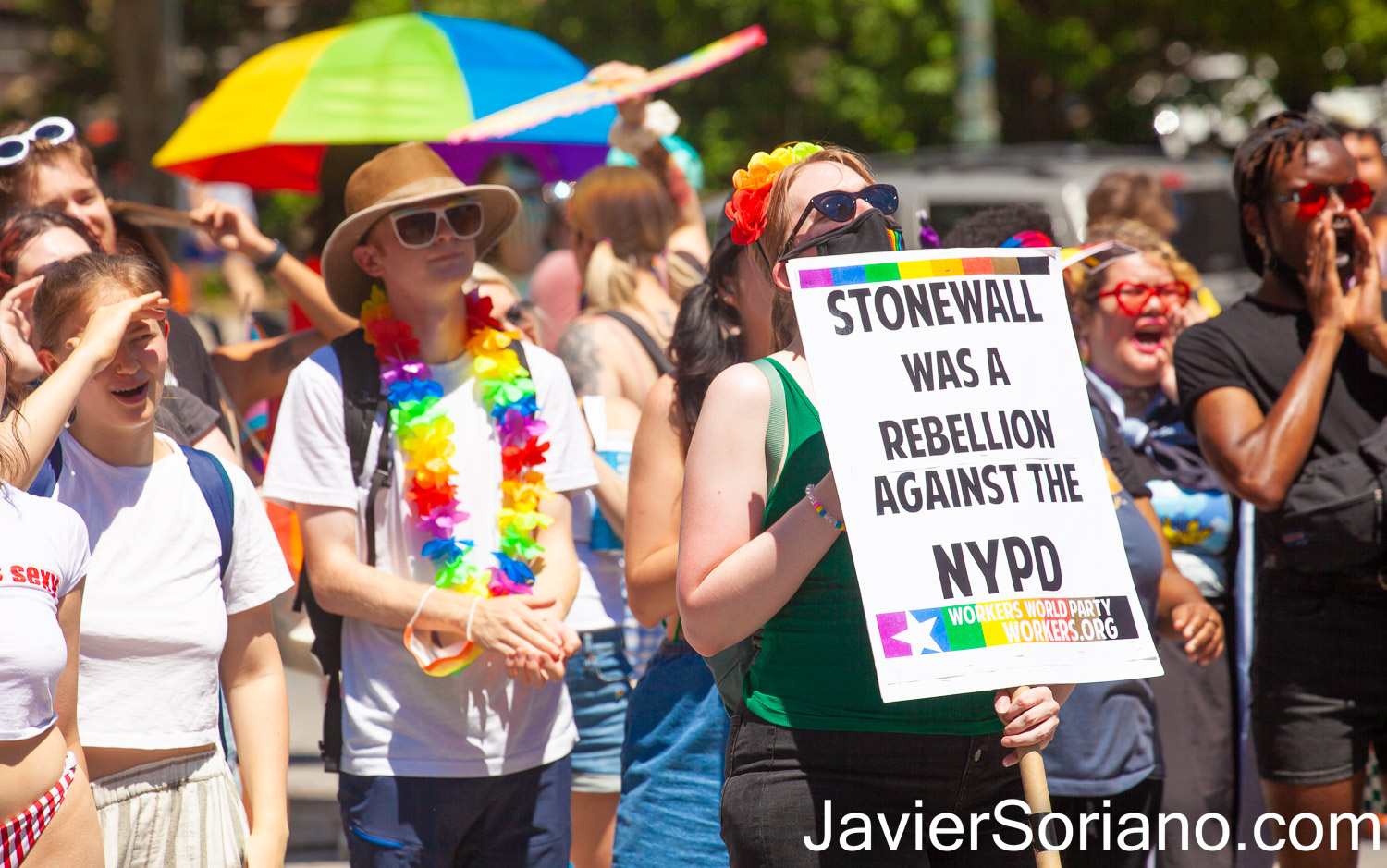 Sunday, June 26, 2022. New York City – The 4th annual Queer Liberation March titled the “Queer Liberation March for Trans and BIPOC Freedom, Reproductive Justice, and Bodily Autonomy” was in Manhattan, New York City, on Sunday, June 26th, 2022. The Lesbian, Gay, Bisexual, Transgender, Intersex, Asexual, Two-Spirit Plus (LGBTQIA2S+) people’s march started in Foley Square and ended in Washington Square Park. THIS PHOTO: Woman at Foley Square with a sign that reads, "Stonewall was a rebellion against the NYPD (New York City Police Department). Photo by Javier Soriano/www.JavierSoriano.com