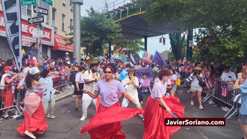 The 8th Annual Knickerbocker Avenue Puerto Rican Day Parade in Bushwick, Brooklyn; Lenapehoking (New York City), was on Sunday, June 14, 2026. THIS PHOTO: "From our bombazos to our parades, we condemn the police raids! No more violence, no more raids, 83rd precinct, out of the parade!"_Adolfina Brooklyn. Photo by Javier Soriano/www.JavierSoriano.com. El 8.º Desfile Anual del Día Puertorriqueño de Knickerbocker Avenue en Bushwick, Brooklyn; Lenapehoking (ciudad de Nueva York), se realizó el domingo 14 de junio de 2026. ESTA FOTO: "De nuestros bombazos a nuestros desfiles, ¡condenamos las redadas policiales! ¡No más violencia, no más redadas; fuera el precinto 83 del desfile!"—Adolfina Brooklyn. Foto de Javier Soriano/www.JavierSoriano.com.