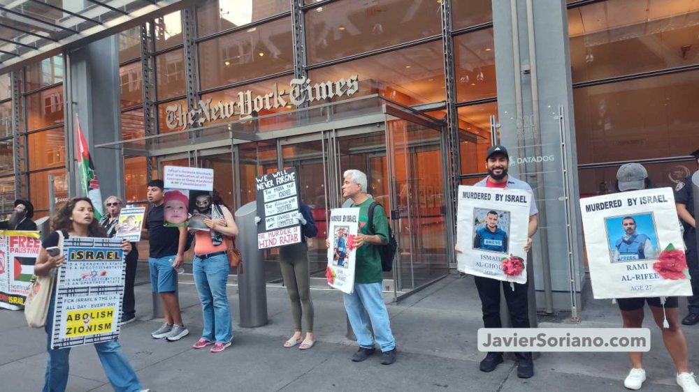 Thursday, July 30, 2026. Occupied Manahatta, Lenapehoking (Manhattan, New York City). – The protest against the western corporate mainstream media in Manhattan, New York City, was on July 30, 2026. THIS PHOTO: Anti-genocide New Yorkers outside The New York Times. Protestors have pictures of Palestinian journalists Ismail Al-Ghoul and Rami Al-Refee, who were murdered by the terrorist, zionist state of Israel on Wednesday, July 31, 2024, and Palestinian journalist Anas Al-Sharif, who was murdered by the apartheid, fascist entity on Sunday, August 10, 2025. Photo by Javier Soriano / www.JavierSoriano.com. Jueves 30 de julio de 2026. Ocupada Manahatta, Lenapehoking (Manhattan, ciudad de Nueva York). – La protesta contra los grandes medios corporativos occidentales en Manhattan, ciudad de Nueva York, tuvo lugar el 30 de julio de 2026. ESTA FOTO: Neoyorquinos contra el genocidio frente a The New York Times. Manifestantes tienen fotografías de los periodistas palestinos Ismail Al-Ghoul y Rami Al-Refee, asesinados por el Estado terrorista, sionista de Israel el miércoles 31 de julio de 2024, y del periodista palestino Anas Al-Sharif, asesinado por la entidad fascista, apartheid el domingo 10 de agosto de 2025. Foto por Javier Soriano / www.JavierSoriano.com.